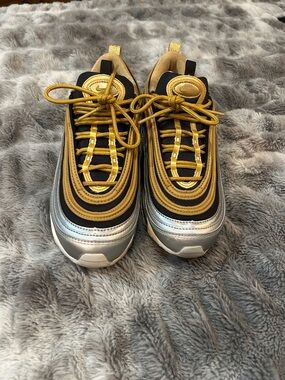 Nike 97 Women’s Size 7.5 Gold and Black Sneaker Inner Label Detail